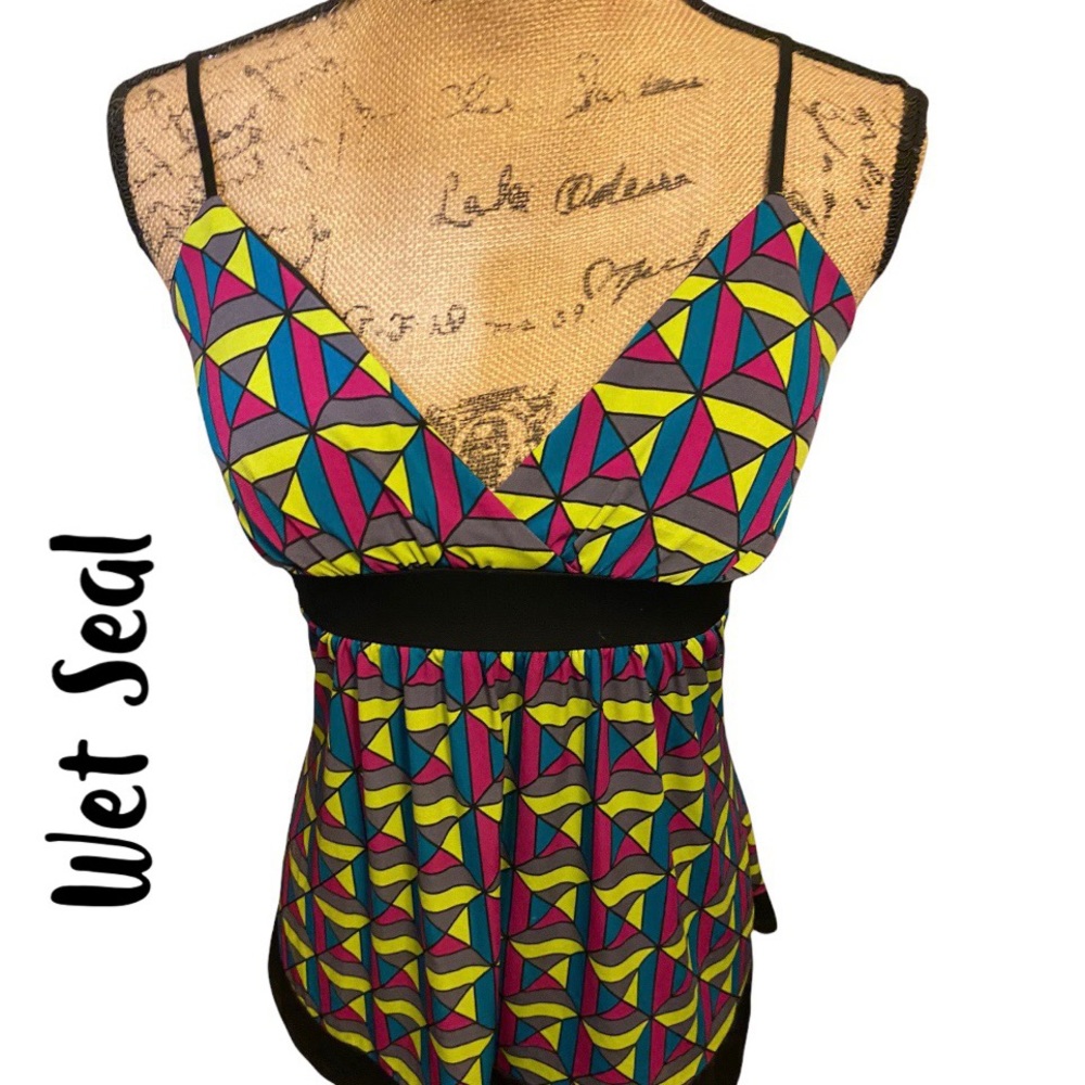 Women’s Top by Wet Seal, New Without Tags, Size M. Inseam: 14, Length:25.